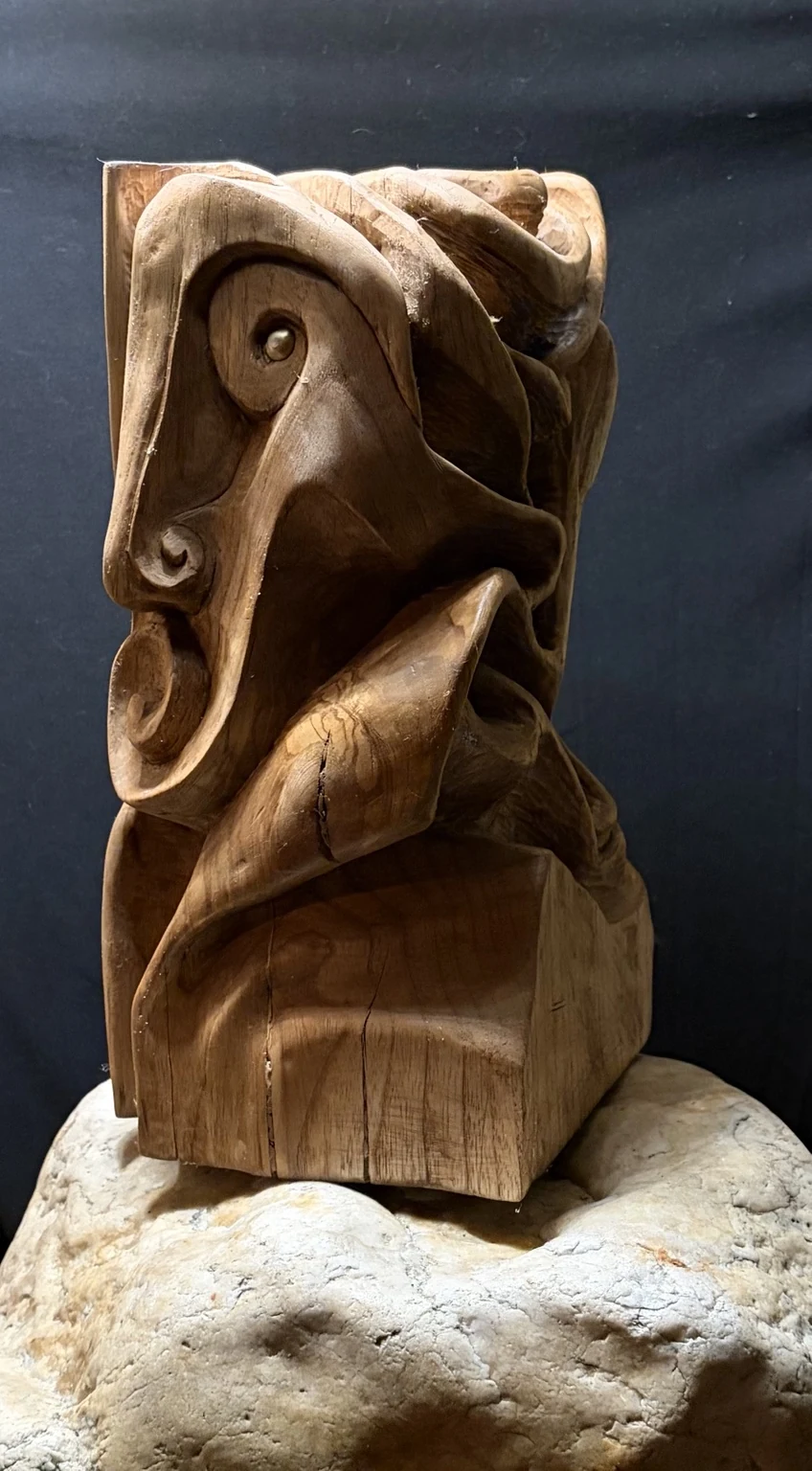 MacWhirr, carved maple sculpture seen from the front.